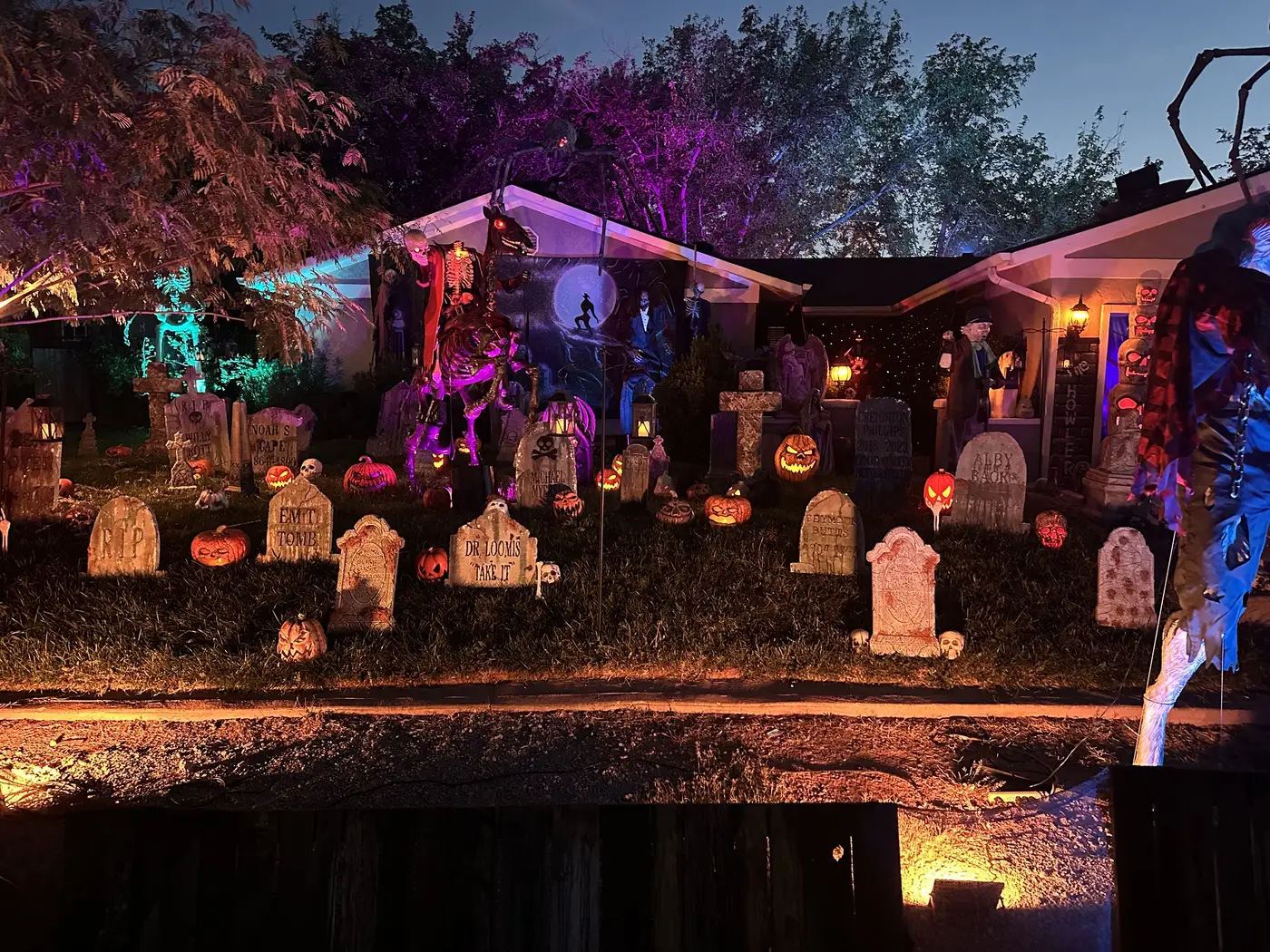 The graveyard display glowing at night